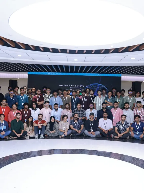 Large group photo of attendees at a technology event.