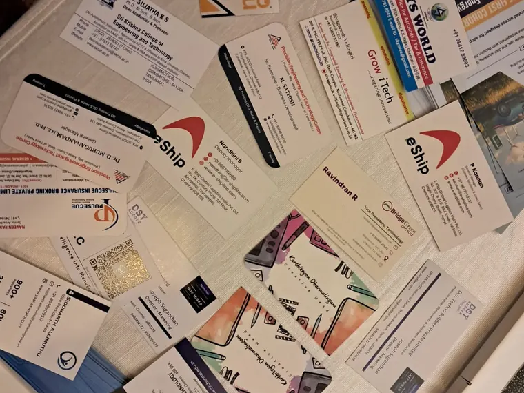 Certificates and award items are arranged on a table.