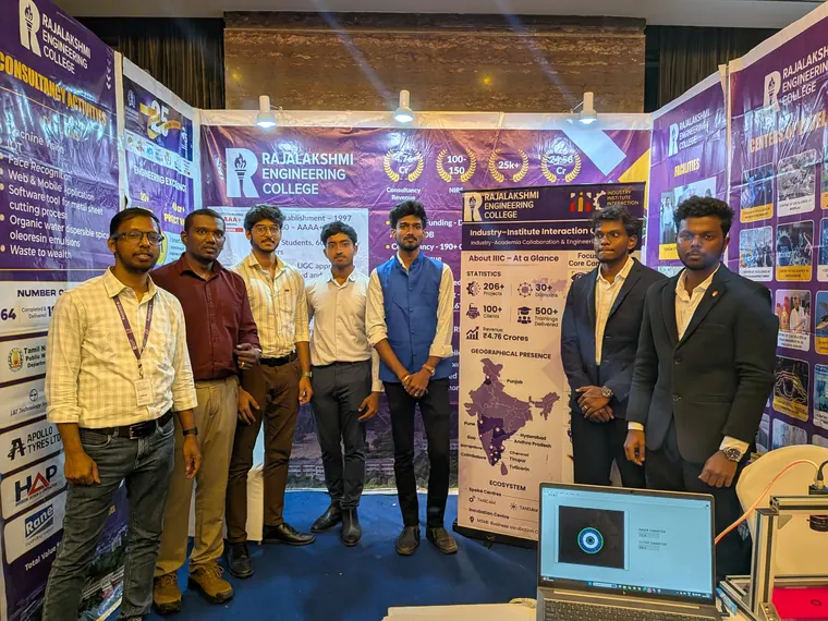 Group photo at a technology event display.